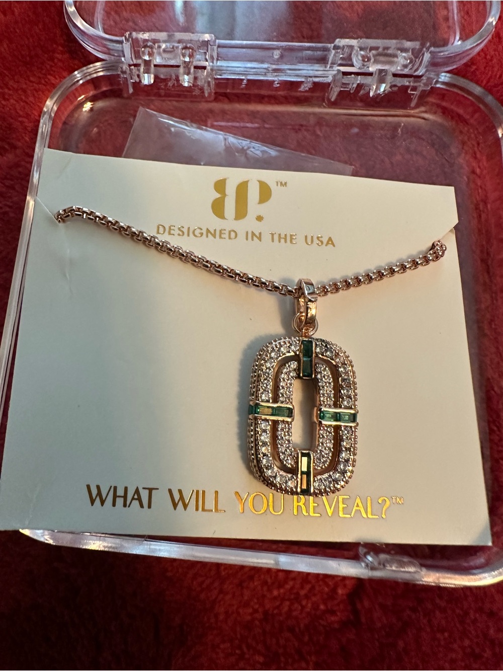 bp Gold Pendant Necklace with Green and Clear Accents